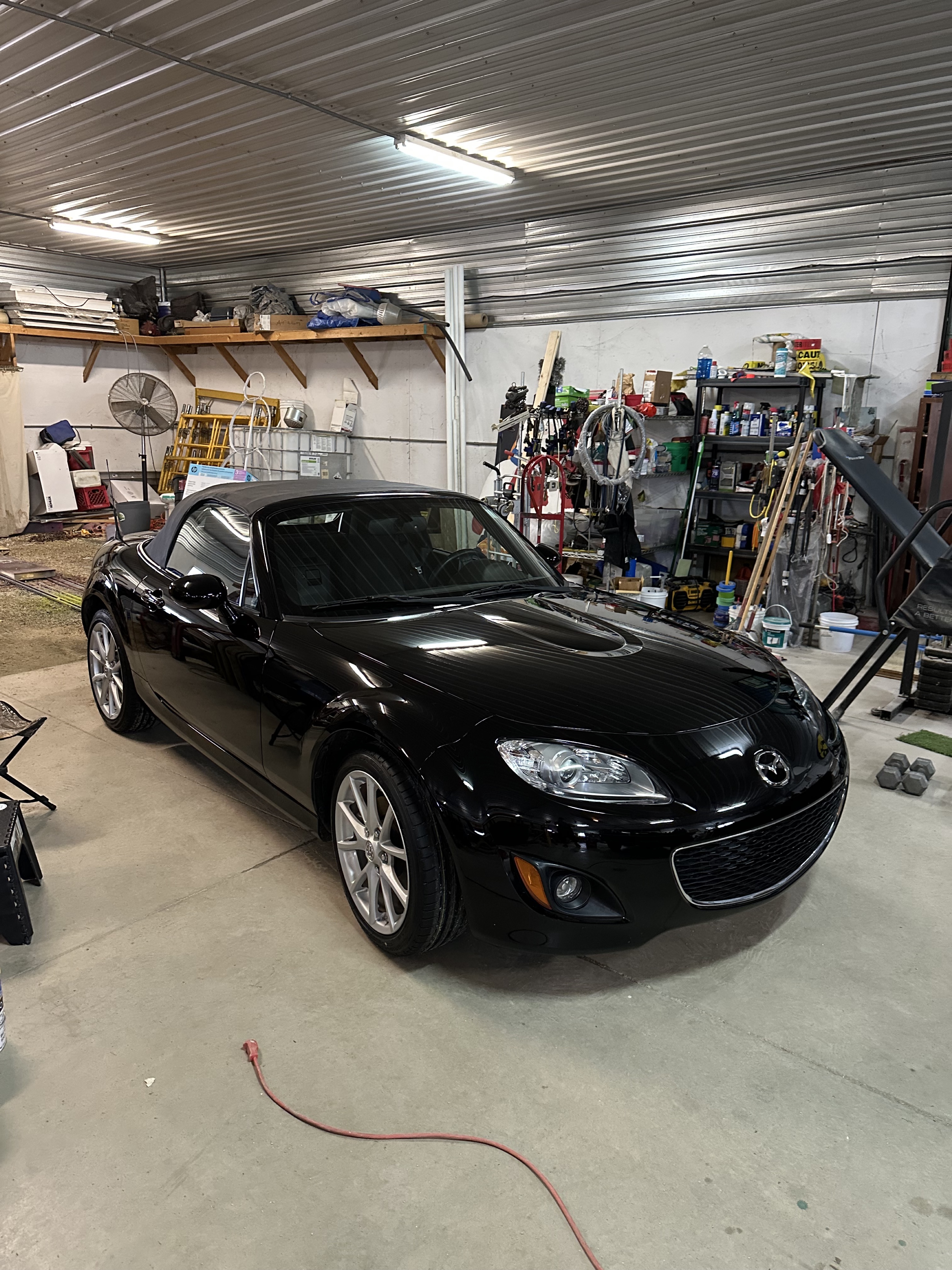 Black Mazda Miata paint correction